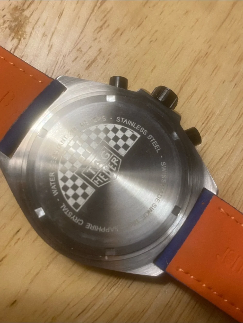 New Tag Heuer Blue Dial Watch with Orange Accents
